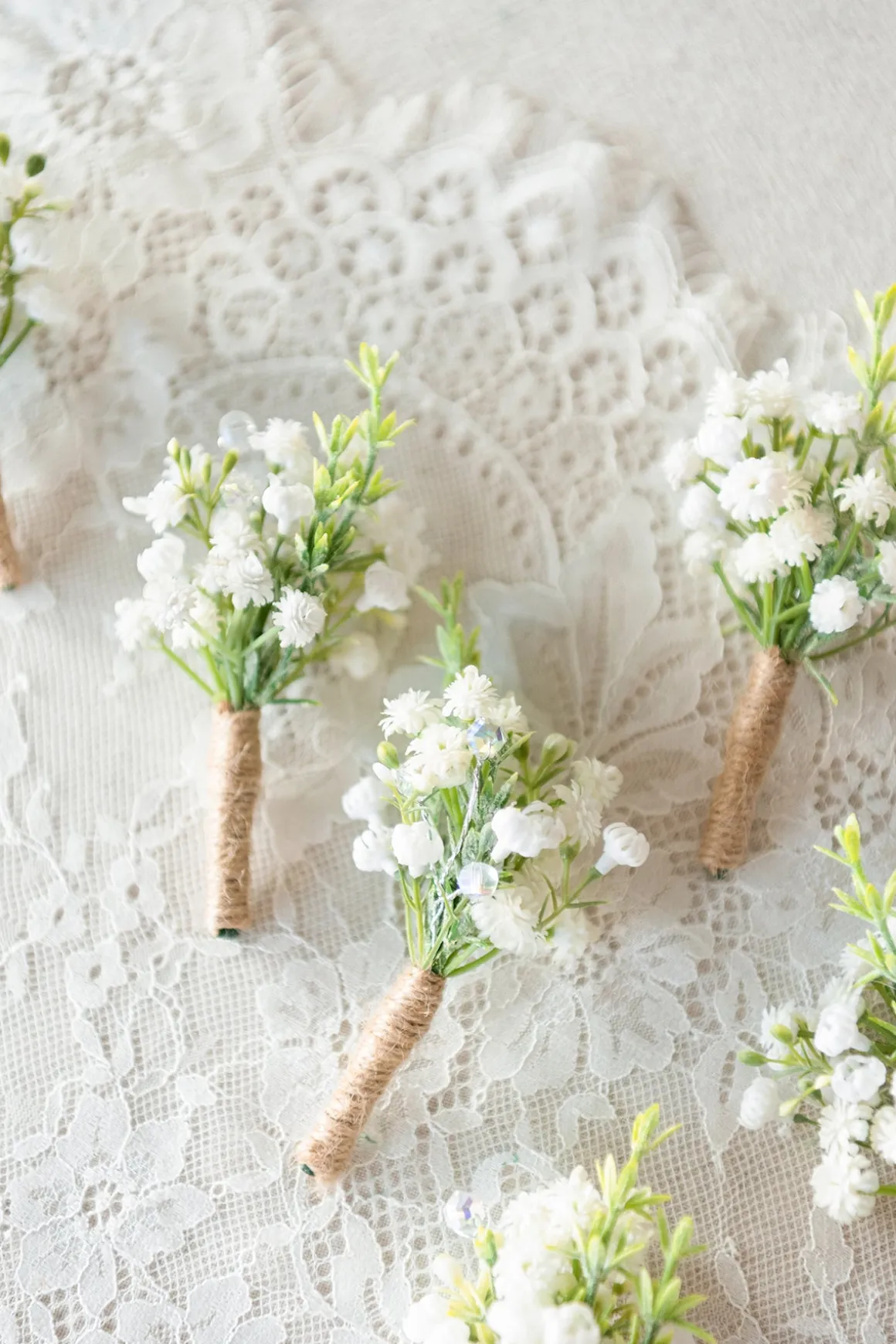 Boutonnieres for Guests in Baby's Breath