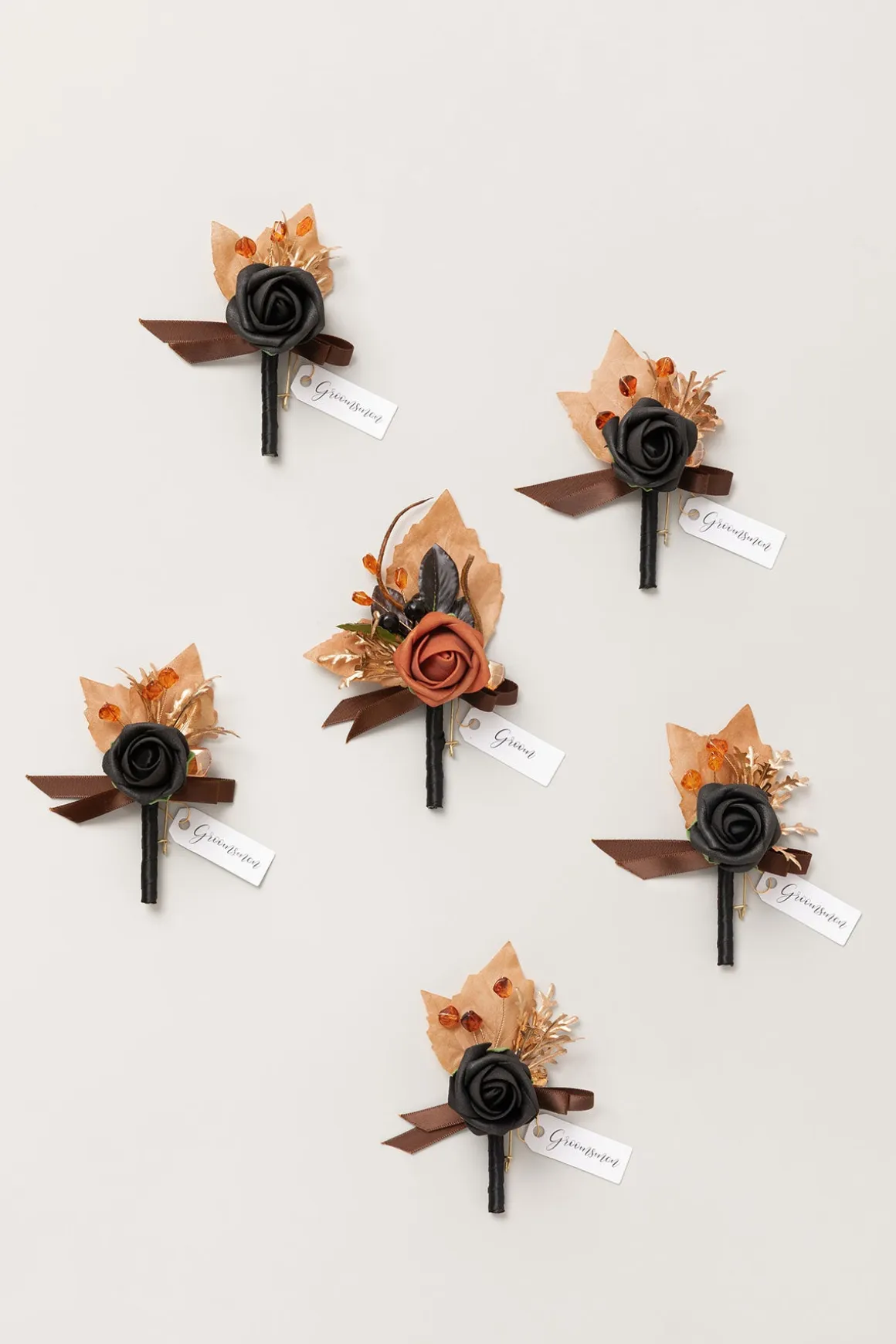 Boutonnieres in Black & Pumpkin Orange