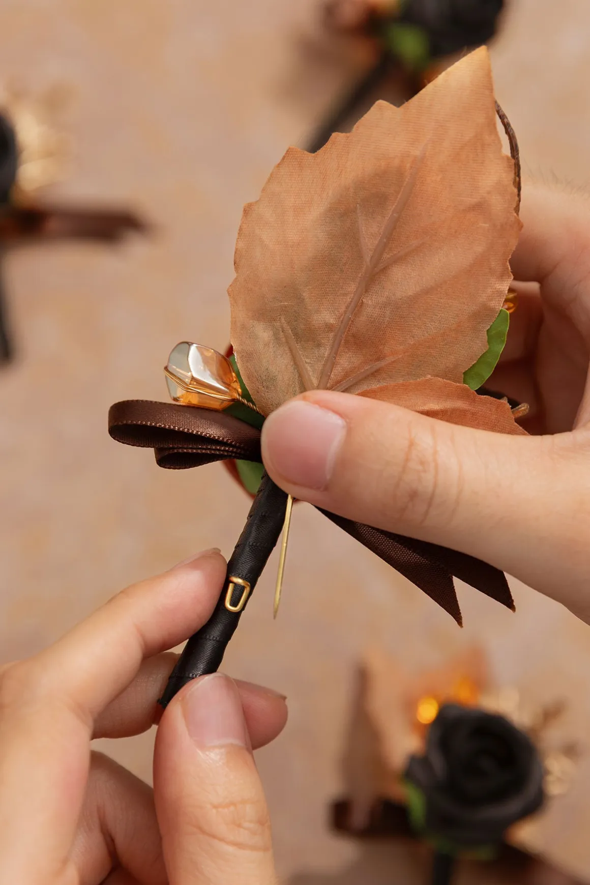 Boutonnieres in Black & Pumpkin Orange