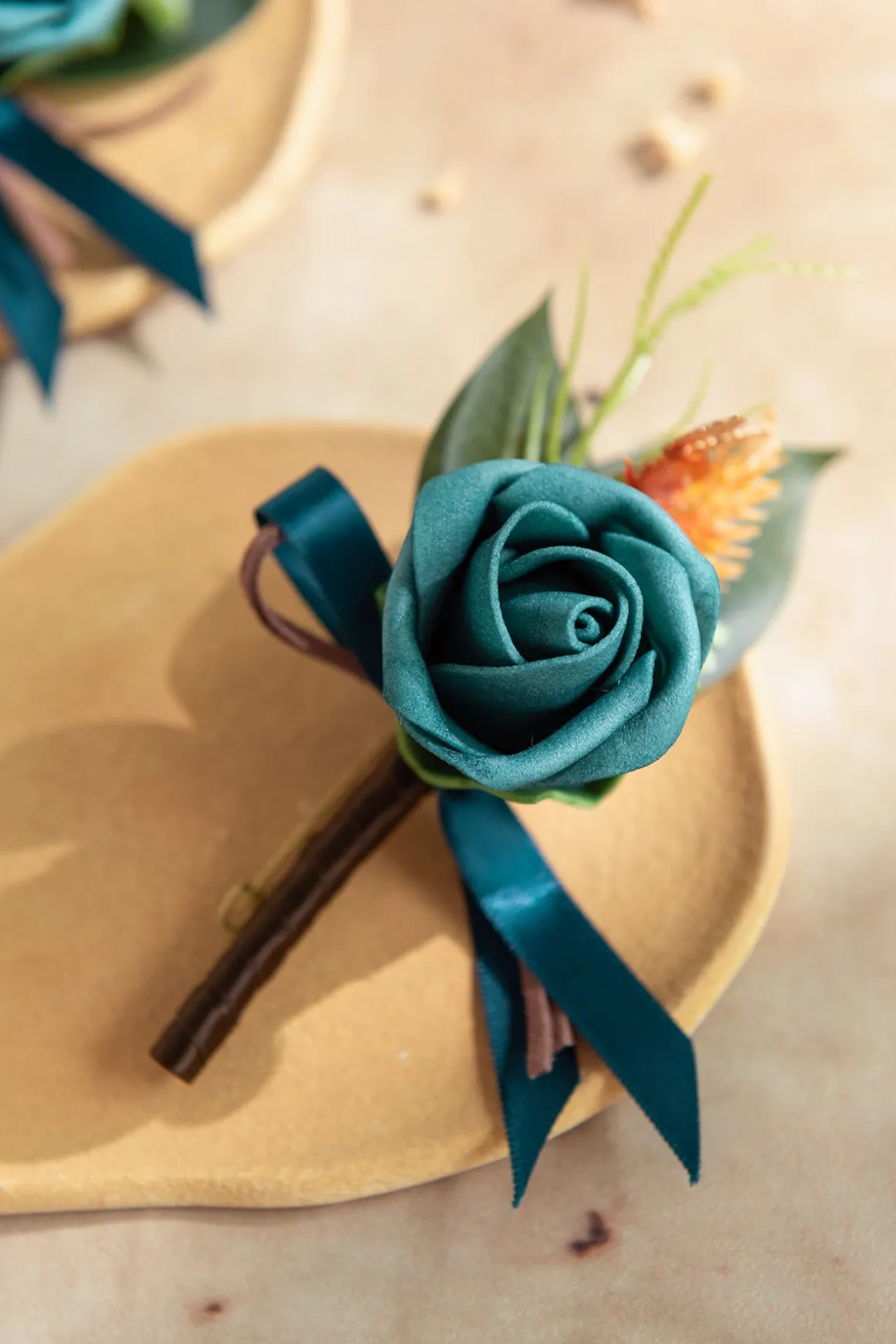 Boutonnieres in Dark Teal & Burnt Orange