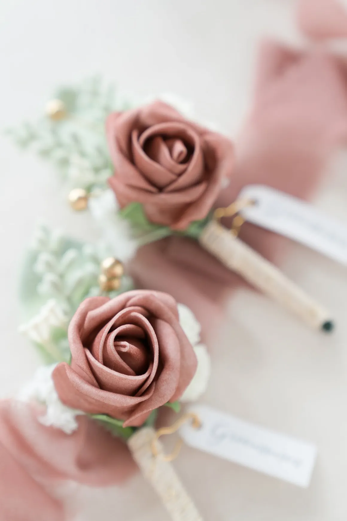 Boutonnieres in Dusty Rose & Cream