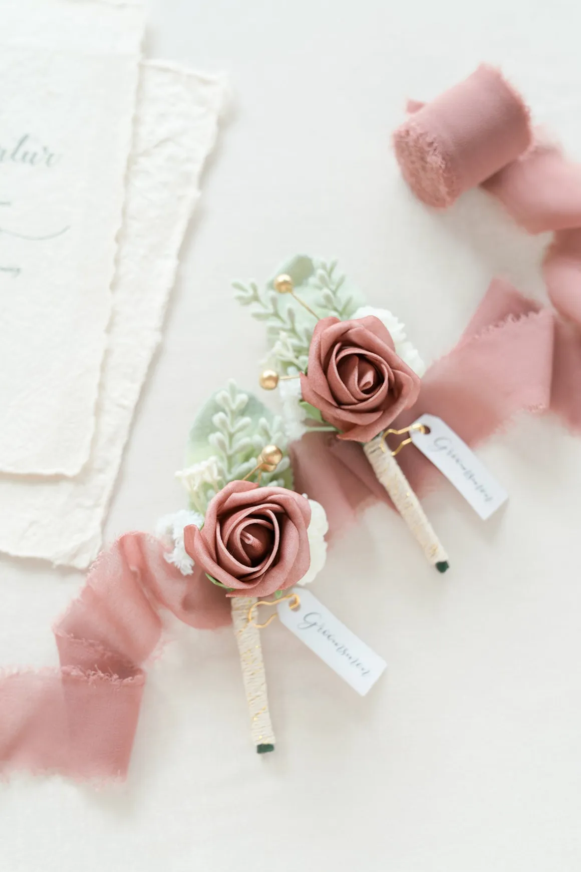 Boutonnieres in Dusty Rose & Cream