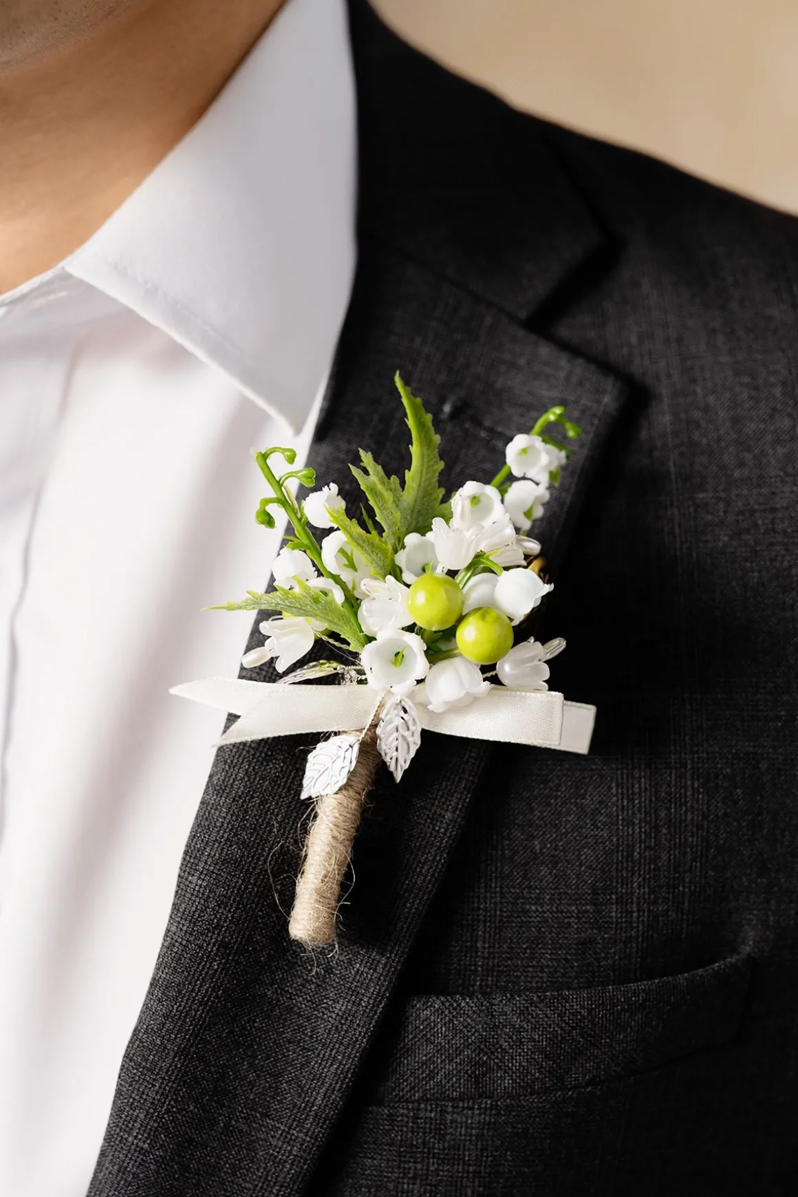 Boutonnieres in May Lily & Olive