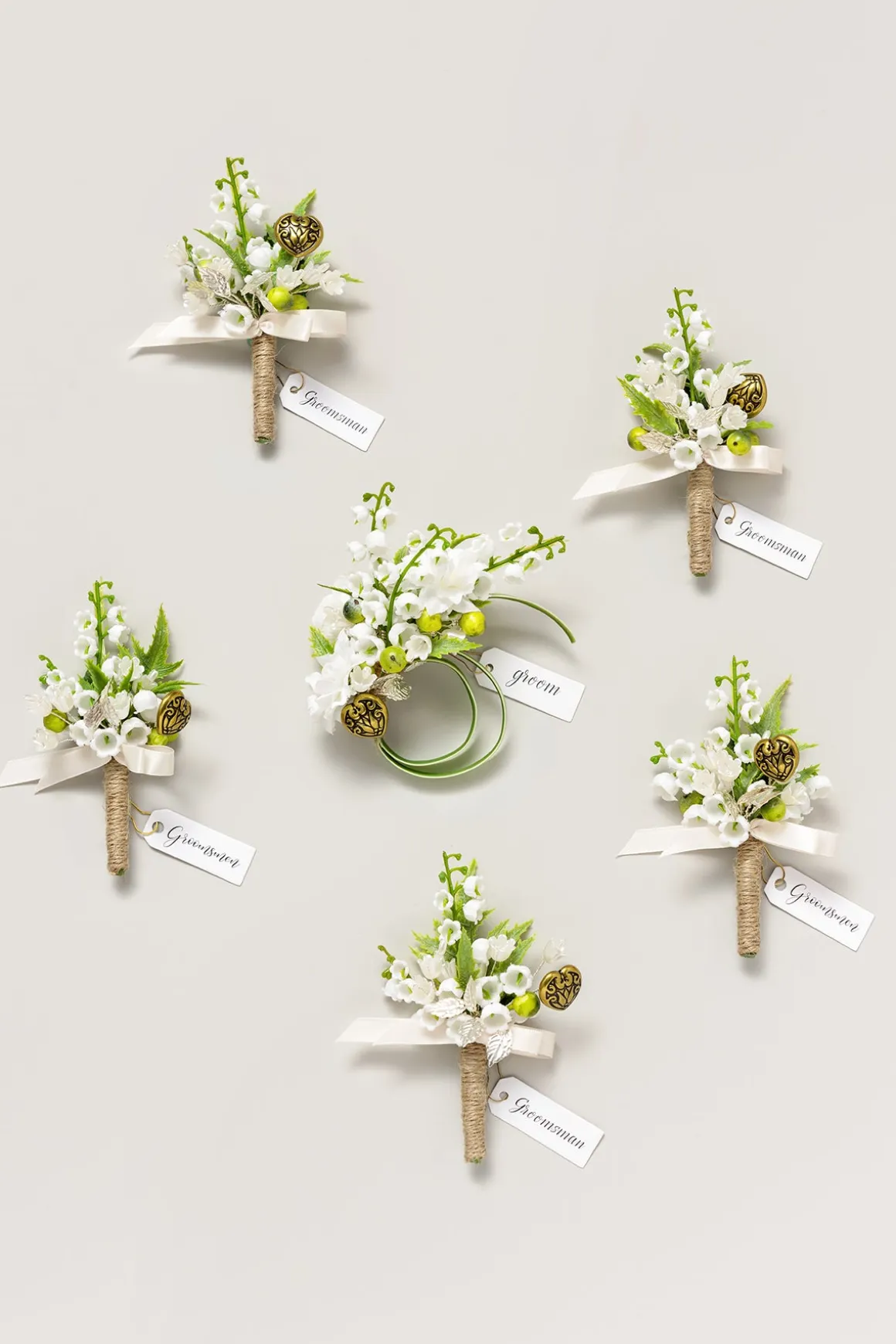 Boutonnieres in May Lily & Olive
