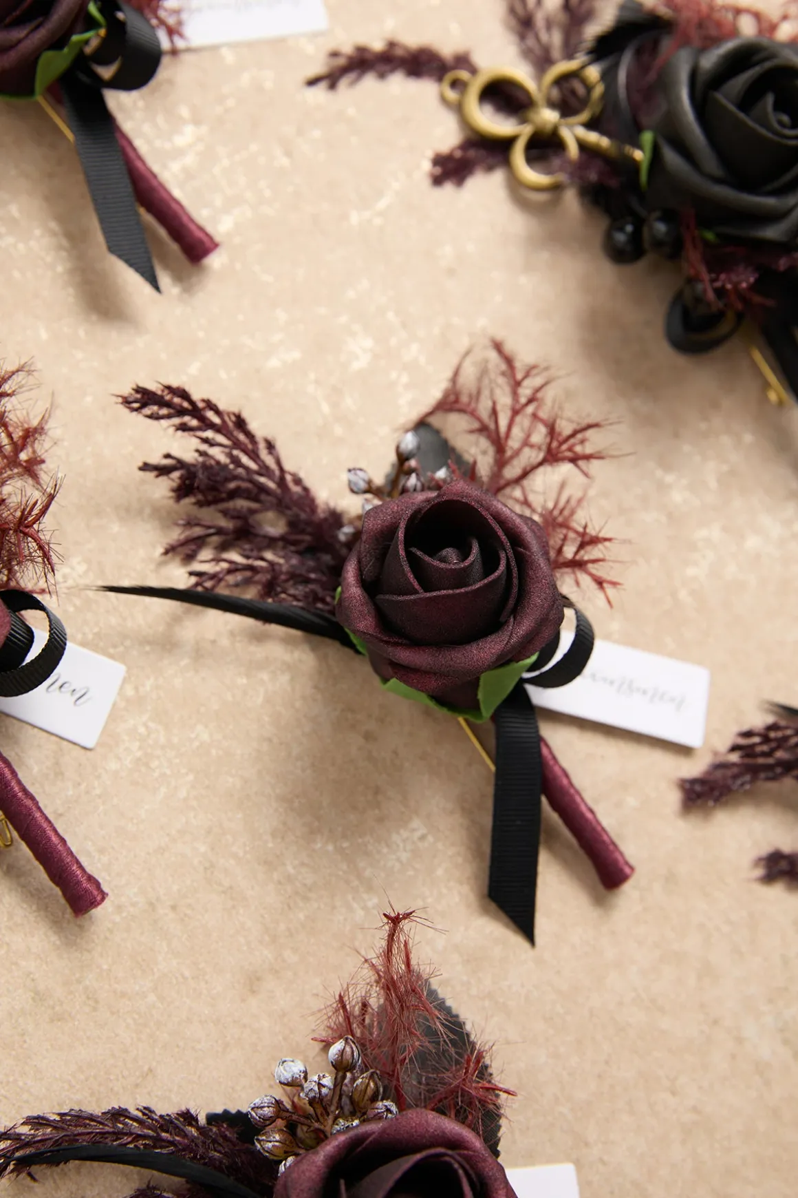 Boutonnieres in Moody Burgundy & Black