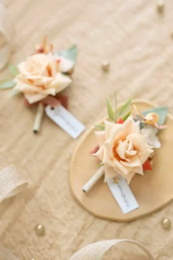 Boutonnieres in Sunset Terracotta