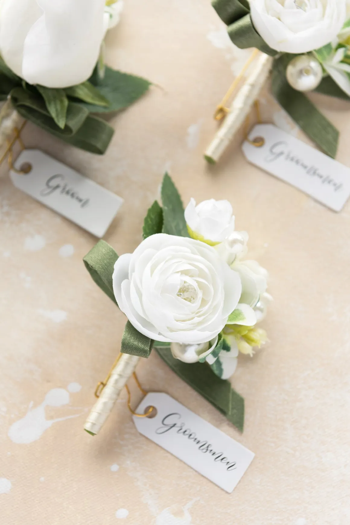 Boutonnieres in White & Sage